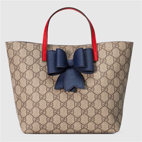 gucci kids children's gg supreme bow tote|Children's GG tote bag with patch .